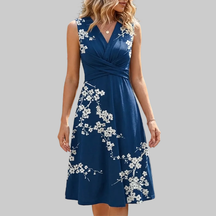 blue dress with white floral patterns.