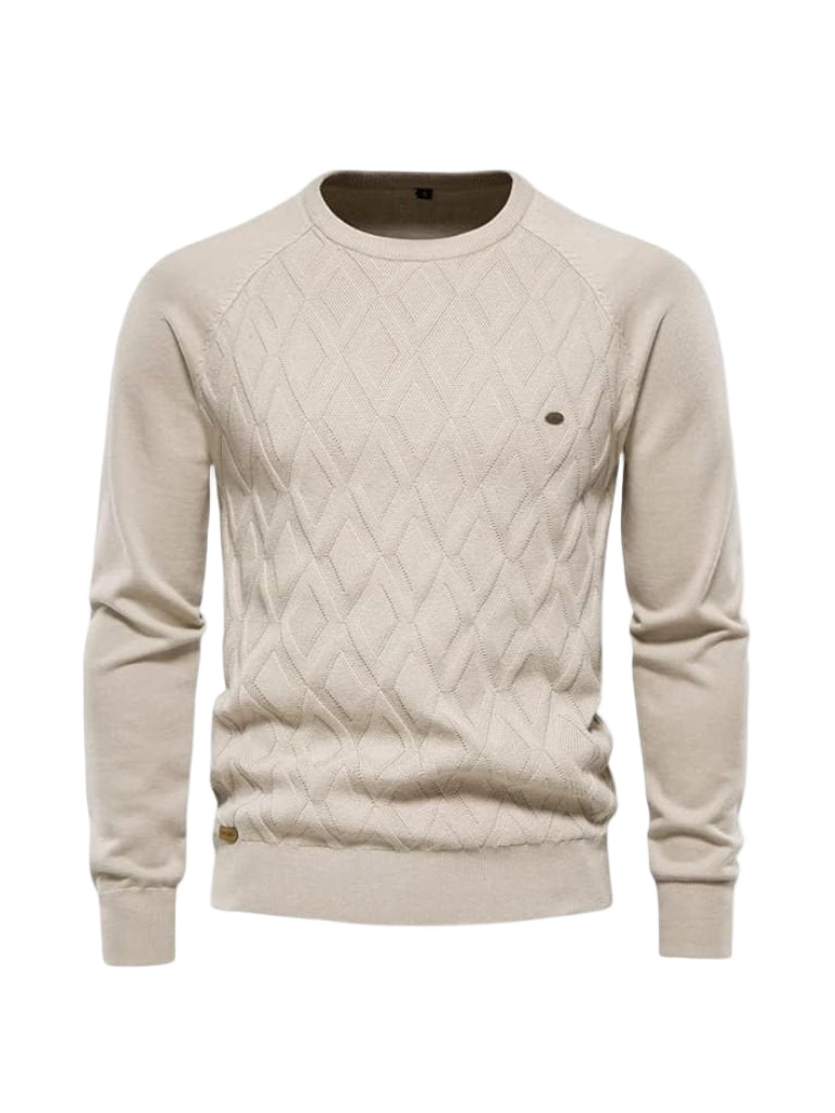 Beige cable knit sweater on a white background
